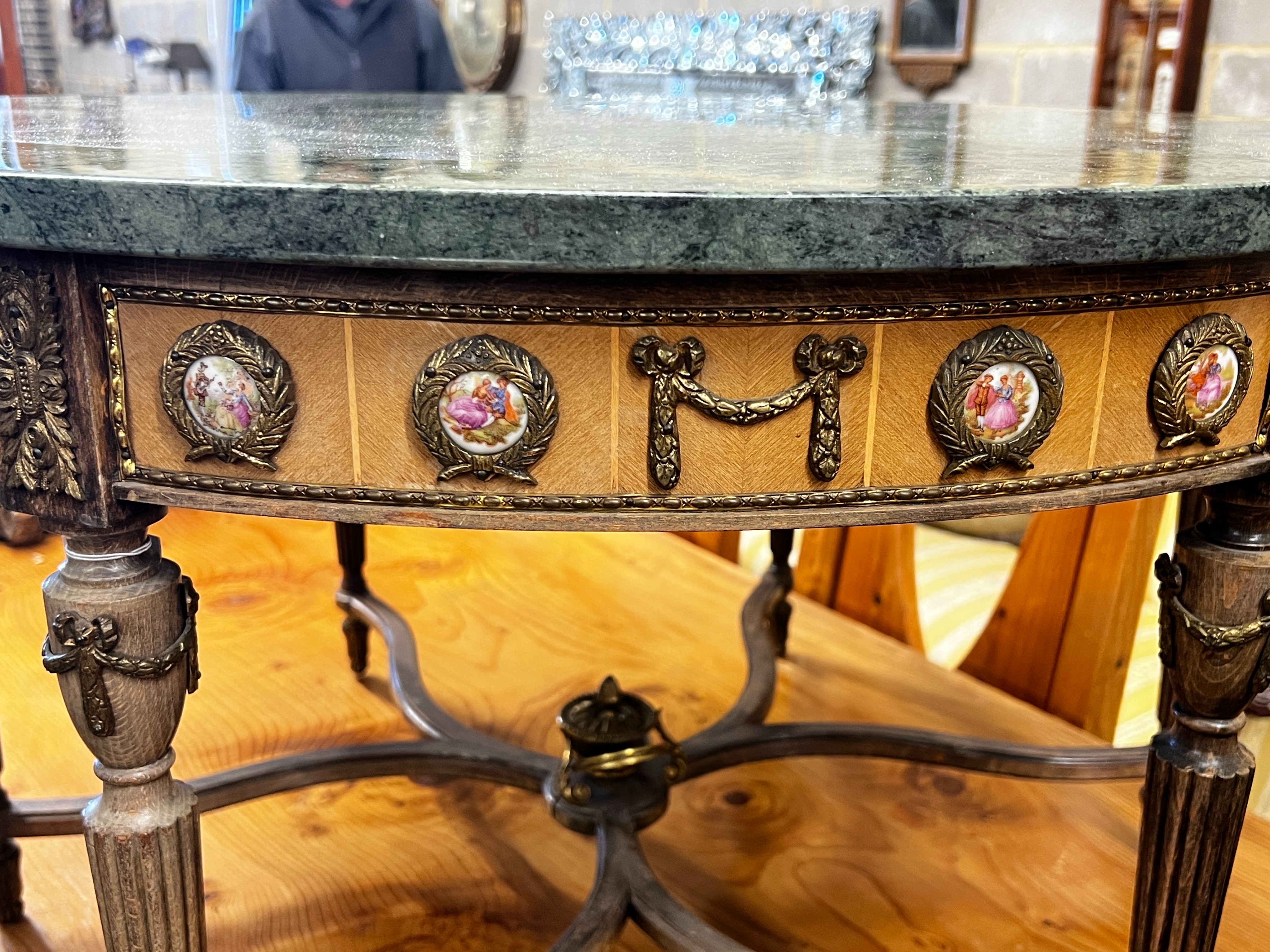 A Louis XVI design circular gilt metal and porcelain mounted marble top coffee table, diameter 84cm, height 48cm